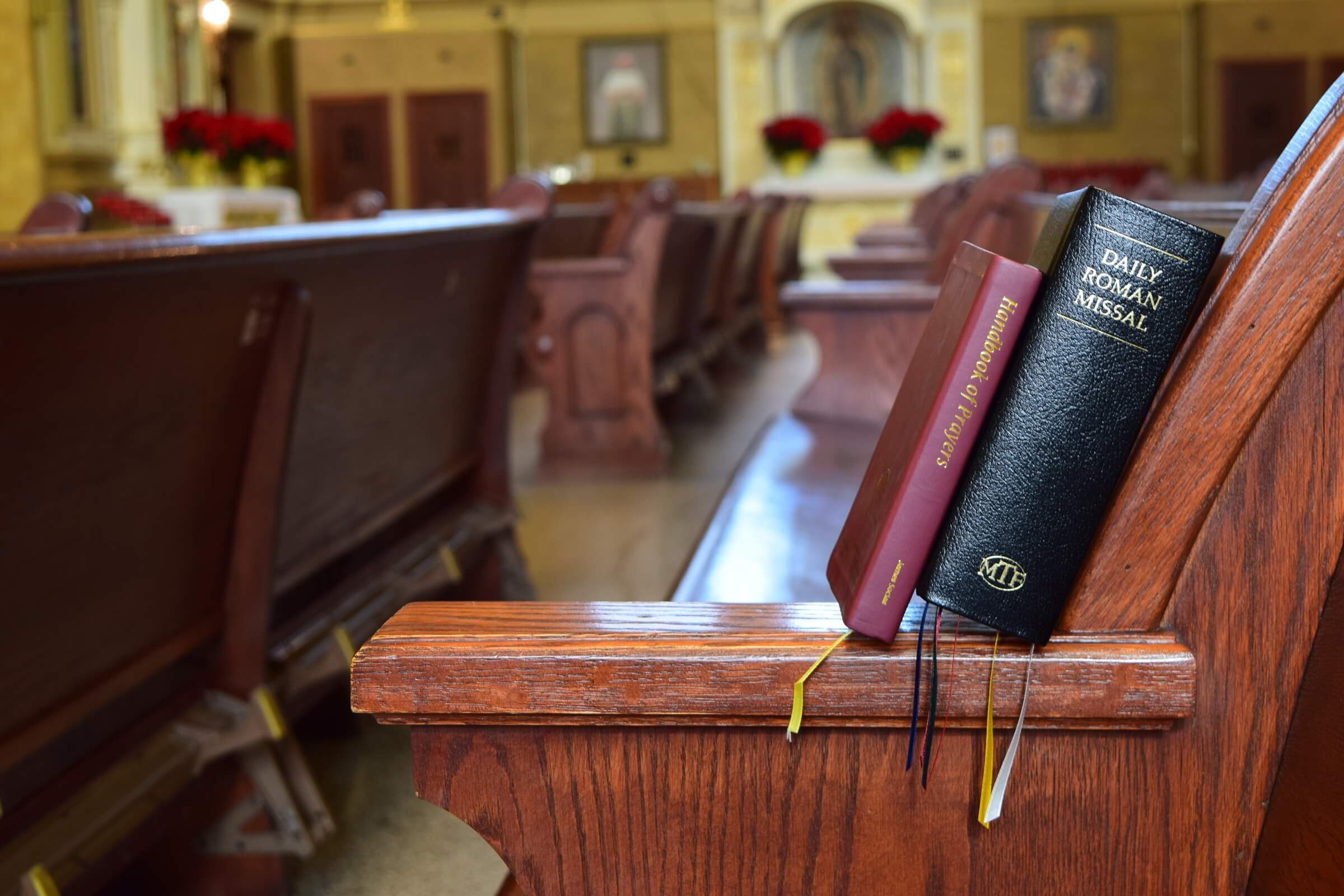 daily-roman-missal-1 Daily Roman Missal in a church pew