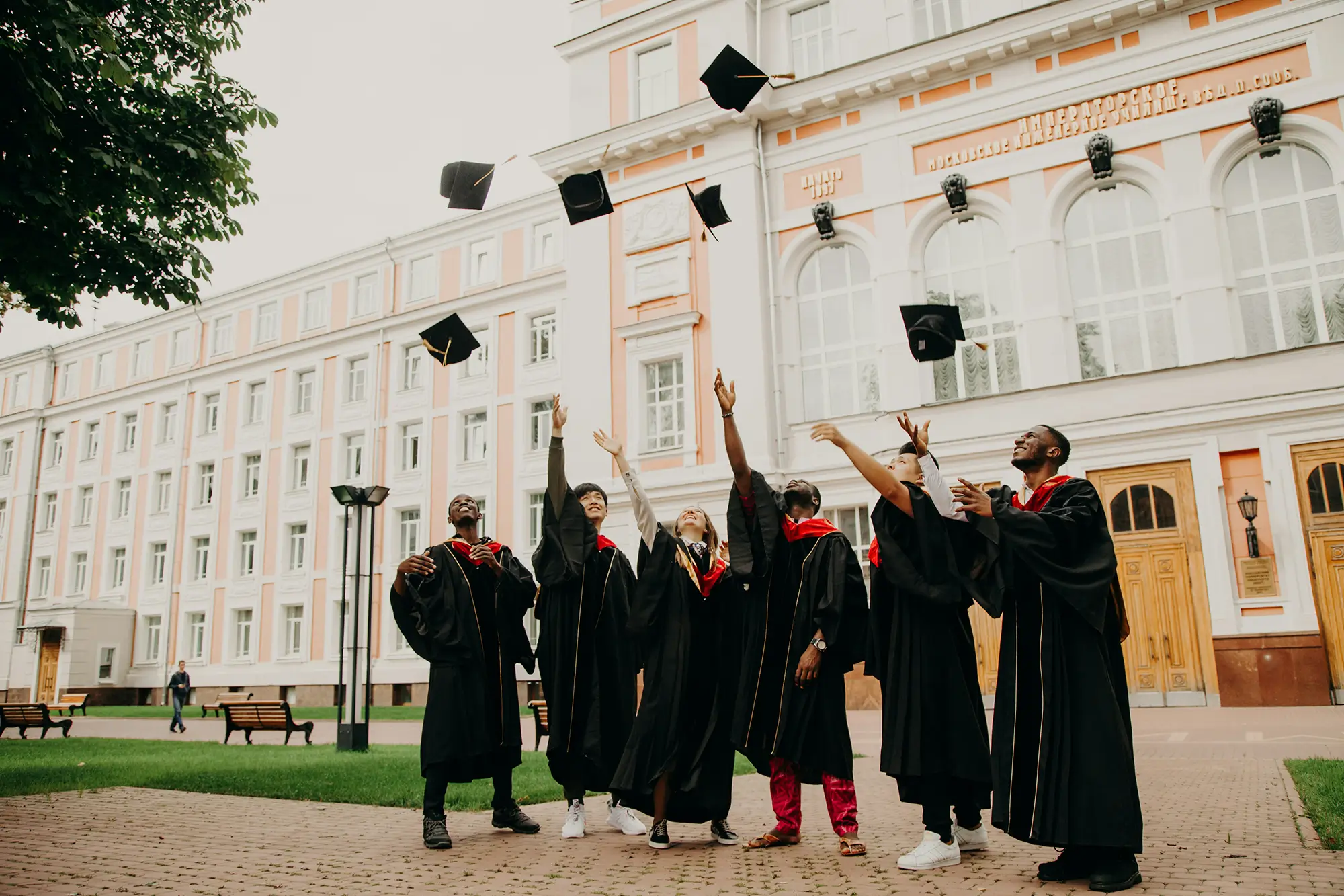 Graduates throwing caps